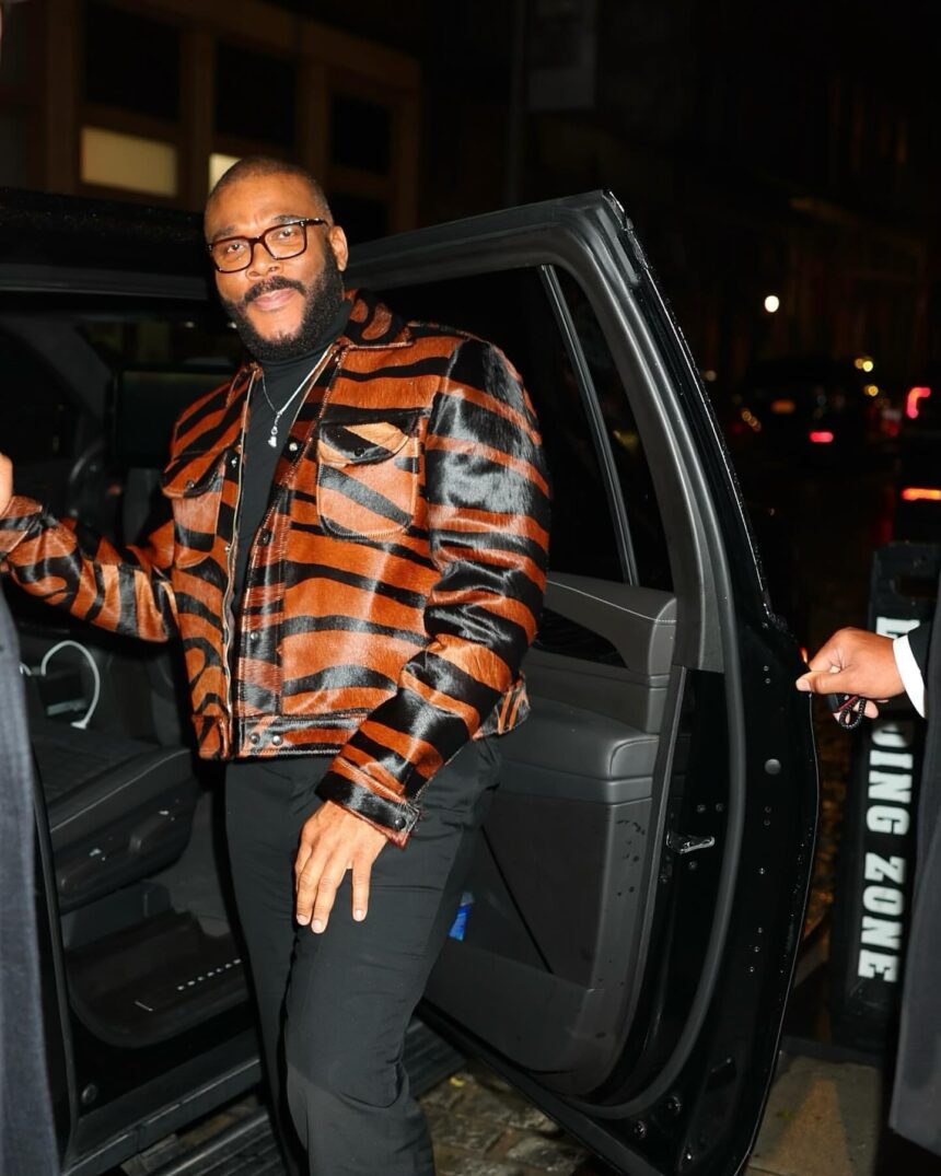 Tyler Perry Promotes Six Triple Eight in a House of Gray Custom Pony Hair Jacket