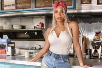 Beyonce Posed in Blue Daisy Dukes for Levis Latest “REIIMAGINE” Campaign