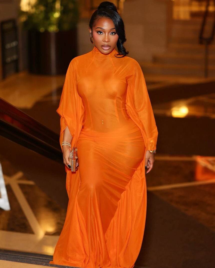 Jayda Cheaves Wears Laquan Smith Orange Spring 2023 Gown and Brandon Blackwood Bomb Accessories to the Black Arts Council Benefit