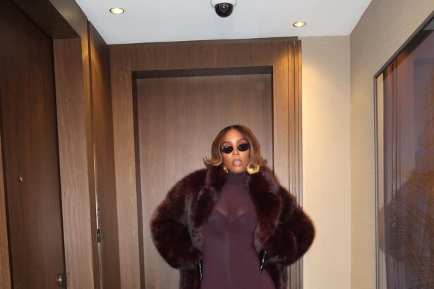 Kelly Rowland Wore a Burgundy ‘Sons of Gemini’ Dress and a $1,490 Retrofete Faux Fur Coat to Broadway