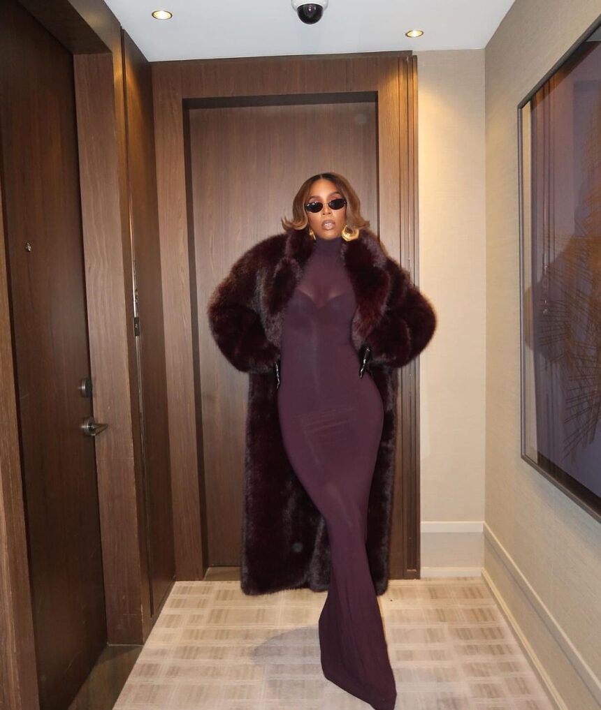 Kelly Rowland Wore a Burgundy ‘Sons of Gemini’ Dress and a $1,490 Retrofete Faux Fur Coat to Broadway