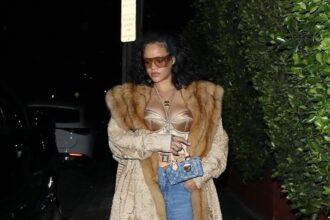 Rihanna Grabbed Dinner in a Vintage Coat, Gold Corset, Blue Jeans and a Louis Vuitton Nano Speedy Bag