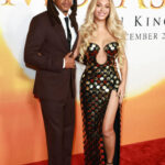 Beyoncé Stuns in a Gold Studded Balmain x Lion King Dress, Blue Ivy Exudes Glamour in a Gold Christian Siriano Gown and Jay-Z Looks Dapper in Fendi at the Disney Mufasa Premiere