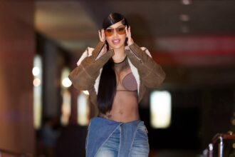 Cardi B Splurged on Holiday Gifts in a $5,773 Maison Alaia Sherling Jacket with a Nensi Dojaka Body Suit and $363 Blue Y/Project Jeans + More!