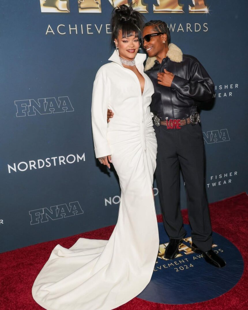 Rihanna and ASAP Rocky Attend the Footwear News Awards in a Custom White Alaia Gown + a Black Leather Phoebe Philo Coat