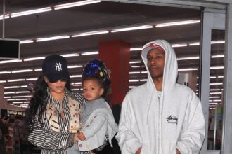 Rihanna and ASAP Rocky Shop at CVS with Son Riot Rose in Striped Bottega Veneta and Stussy