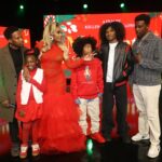 Yandy Smith Sings at the Mr Santa the Movie Premiere in Atlanta in a Red Oyemwen Gown Available at Fashion Bomb Daily Shop!