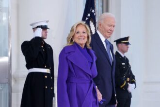 Dr. Jill Biden Waves Goodbye to the White House in a Purple Ralph Lauren Coat