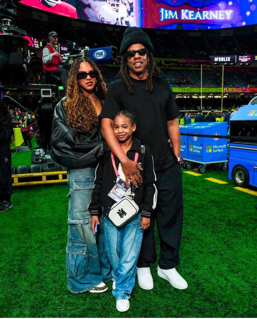 Jay-Z Attended the Superbowl in an All-Black Look with Blue Ivy in a Black Balenciaga Leather Jacket and Rumi Rocking an Off-White Amiri Crossbody